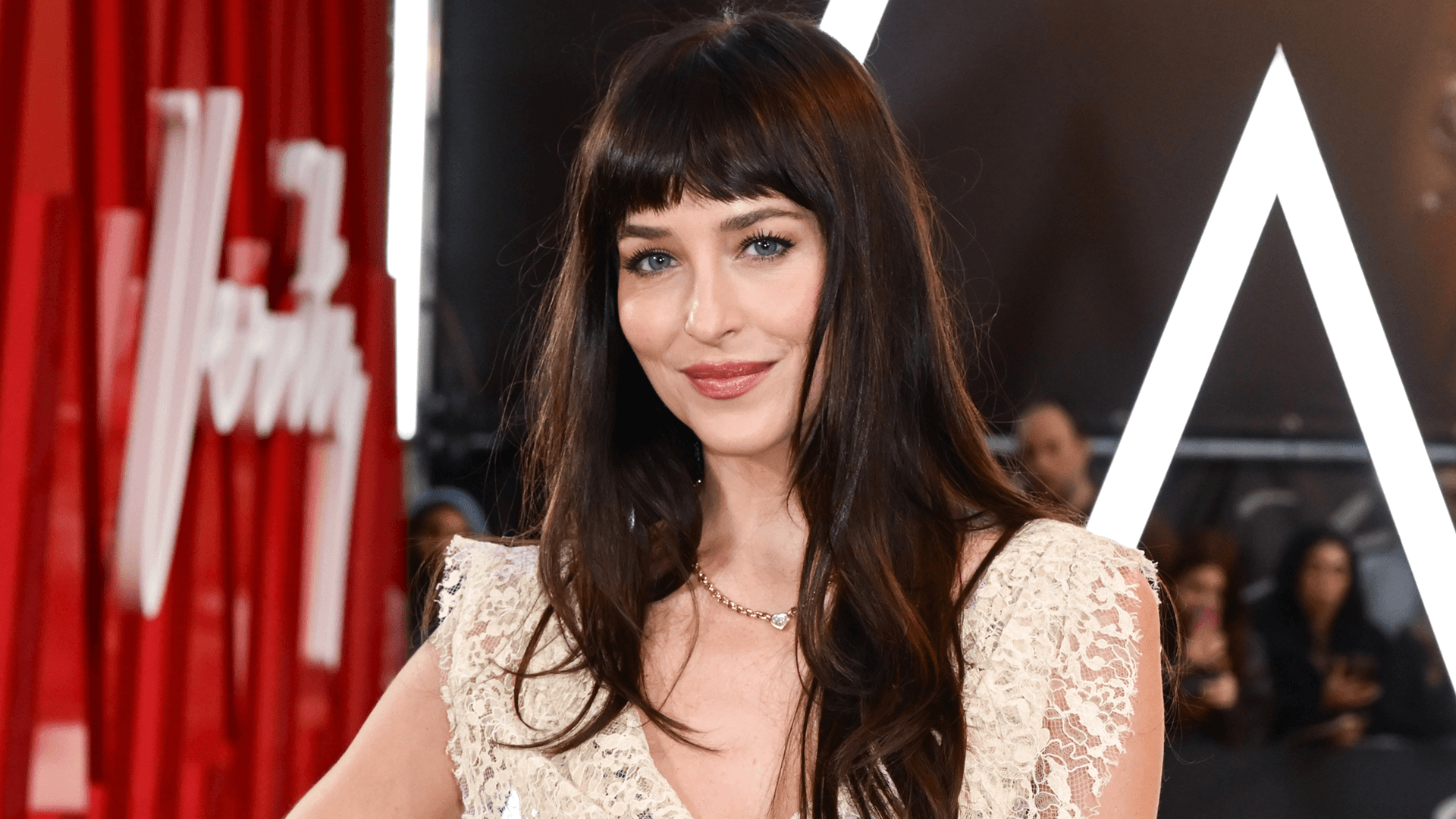 A Return to Red: Dakota Johnson Reclaims the Naked Dress