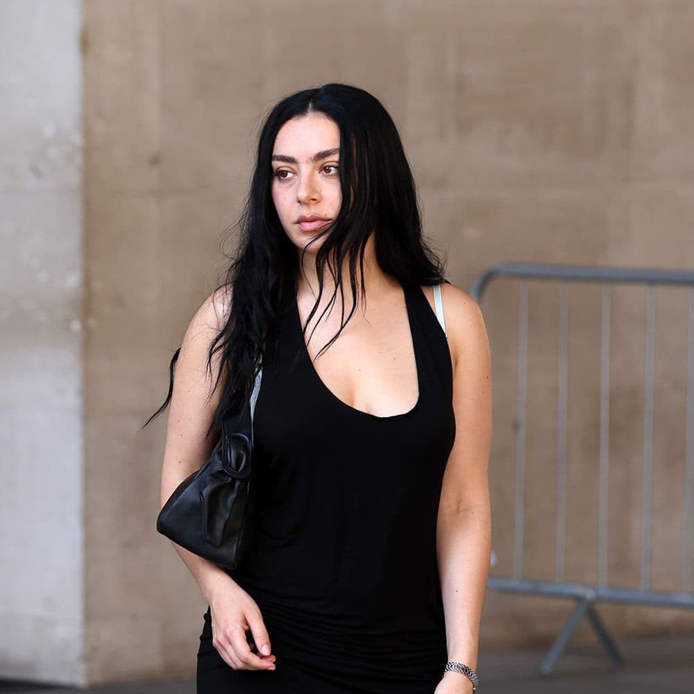  If You Want to Look Cooler in a Black Dress This Summer, Wear This Exact Shoe Color 