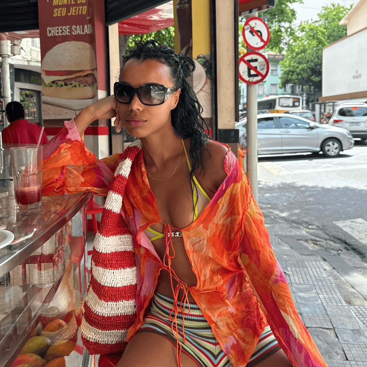  Everyone Chic Has Moved on From Denim Shorts—This Is What They're Wearing With Summer Tops Instead 