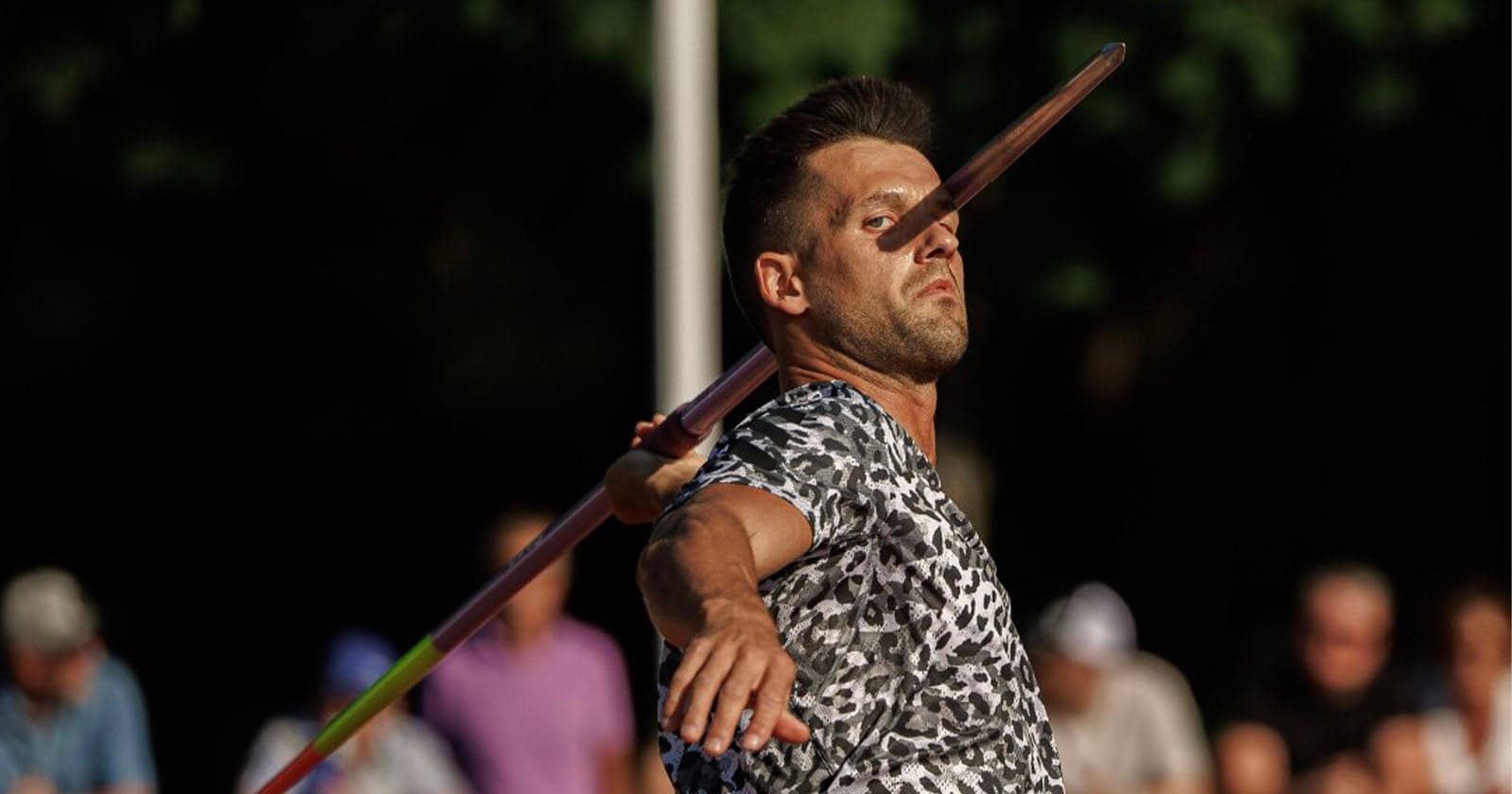 This Javelin Thrower Looks Like He is Impaling Himself in Crazy Optical Illusion Photo
