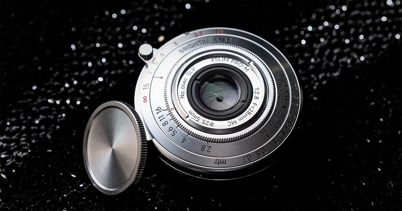 Brightin Star’s Incomprehensibly-Thin 28mm f/2.8 Lens Now Comes In Stylish Silver