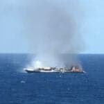 U.S. Coast Guard Coordinates Rescue Of 27 Crew From Burning Vessel Off Galapagos
